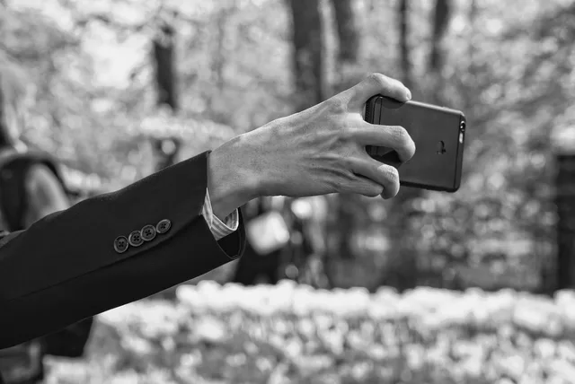 man, arm, hand, finger, smartphone, selfie, self portrait, photography, taking picture, holding, grip, person, people, gray phone, gray mobile, gray photography, gray smartphone, gray telephone, selfie, selfie, selfie, selfie, selfie, grip, grip, people. Private Image Repost Response Case: A Fictional Creator